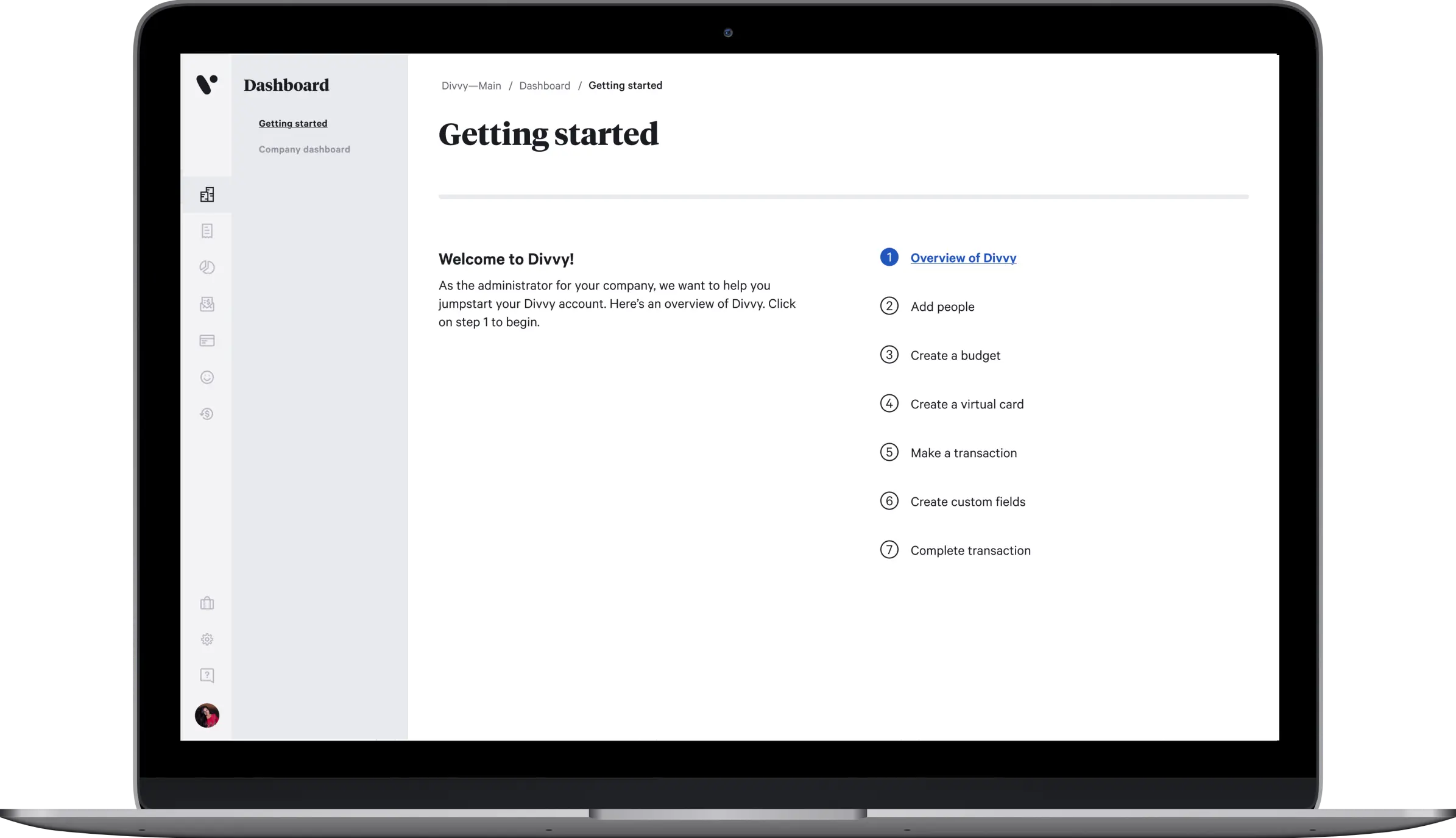 A laptop displaying Divvy's "Getting started" dashboard, with a welcome message and a seven-step onboarding checklist beginning with "Overview of Divvy."