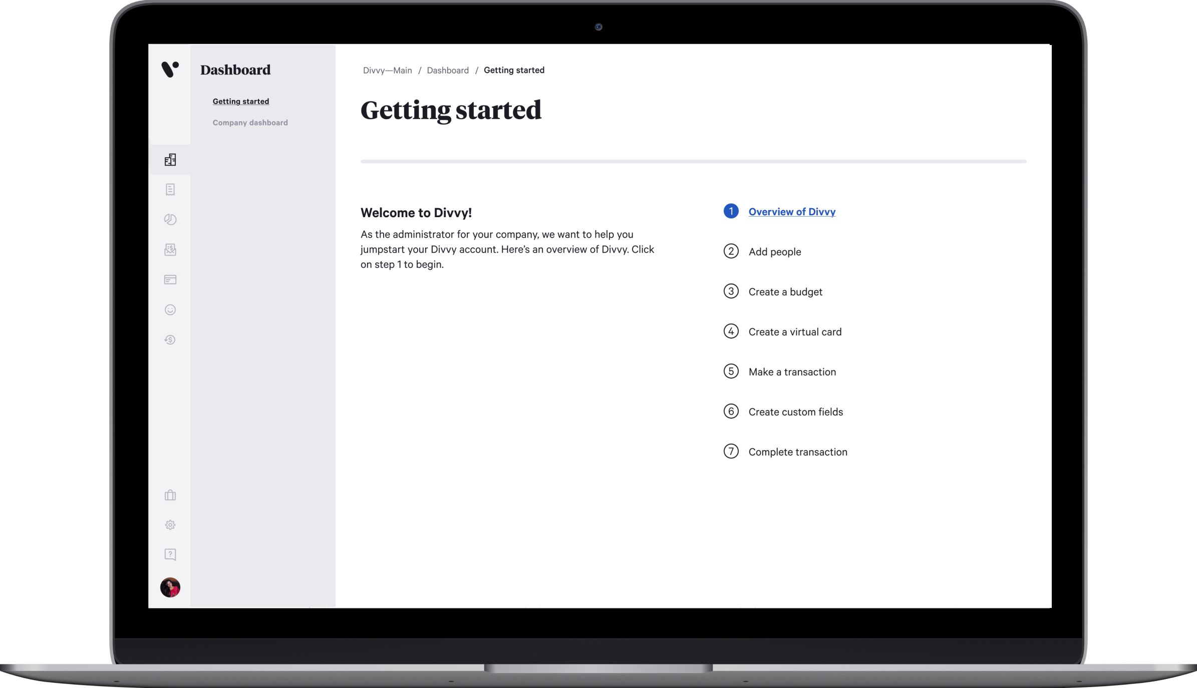 A laptop displaying Divvy's "Getting started" dashboard, with a welcome message and a seven-step onboarding checklist beginning with "Overview of Divvy."